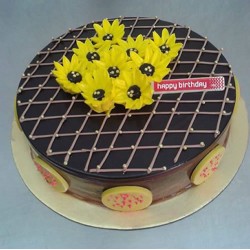Chocolate cake with flowers on top